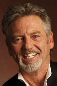 Larry Gatlin in Outlaws: The Legend of O.B. Taggart