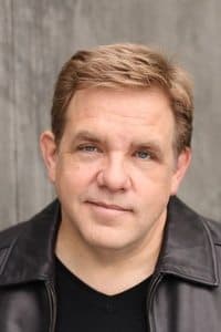 Brian Howe in Trail of the Screaming Forehead