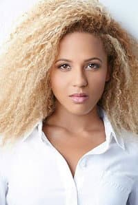 Robyn Alomar in Holy Hustle
