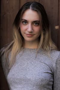 Katie Loftus in By Deception