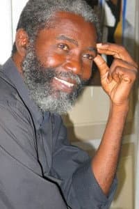 Aliou Cissé in Tjenbé Red