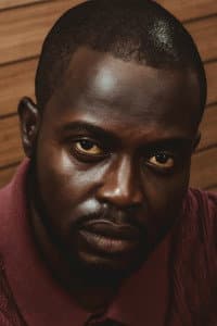 Eric Nwanso in Baptized by Fire