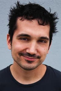 Brandon Farmahini in Rooster Teeth Shorts - Volumes 4 & 5