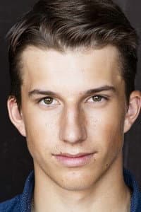 Logan Tomanek in Christmas in Midnight Clear