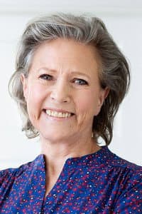 Birthe Neumann in Humørkort-stativ-sælgerens søn