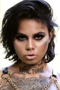 Genevieve Sinn in Tatted Tails