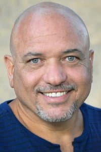 Carlos Guerrero in How to Frame a Family