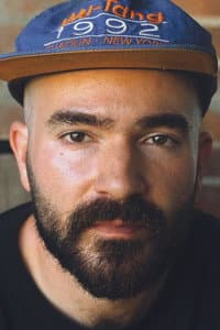 Michael J. Ahern in Queen of the Rats