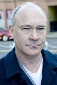 Ewan Stewart in Biting the Hands