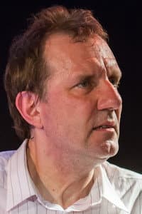 Kevin Morris in Dr. Feelgood: Live 1990 at Cheltenham Town Hall