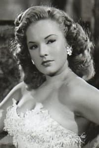 Gina Romand in Los siete proscritos