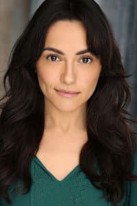 Myrna Velasco in Attack of the Killer Tomatoes: Organic Intelligence