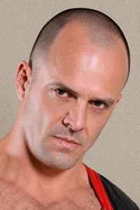 Carlo Cox in Men at Work