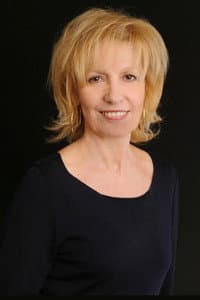Catherine Barma in La face cachée de l'homme en noir