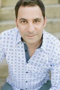 Amos Glick in The Village Barbershop