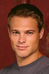 George Stults in A Kiss on Candy Cane Lane