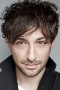 Alex Zane in Cannibals and Carpet Fitters