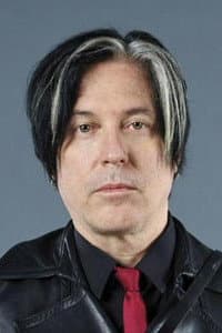 Troy Van Leeuwen in Queens of the Stone Age: Over the Years and Through the Woods