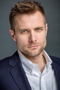 Neil Hopkins in Skyline