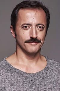 Enrique Asenjo in 12 + 1, una comedia metafísica