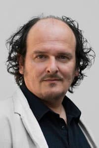 Roland Vouilloz in The Quiet Between Storms