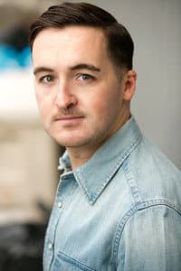 Adam DeCarlo in The Uninvited Guest