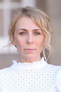 Belinda Gosbee in Excess Baggage
