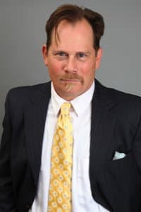 Lou Sumrall in The Briefcase