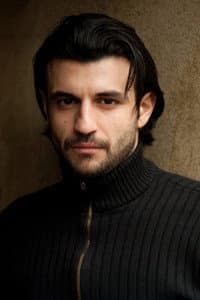 Sam Vincenti in The Take