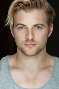 Josh Collins in A Christmas Less Traveled