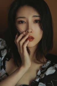 Xi Wang in Bitter Flowers
