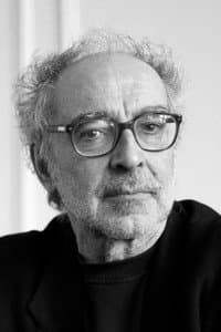 Jean-Luc Godard in Les fiancés du pont Mac Donald ou (Méfiez-vous des lunettes noires)