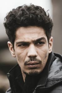 Anis Benbatoul in La Terre et le Sang