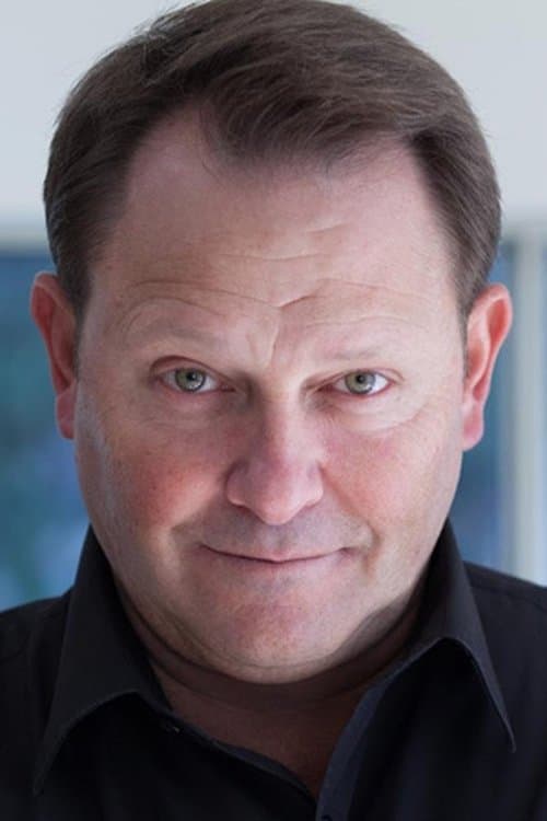 Kevin E. West foto