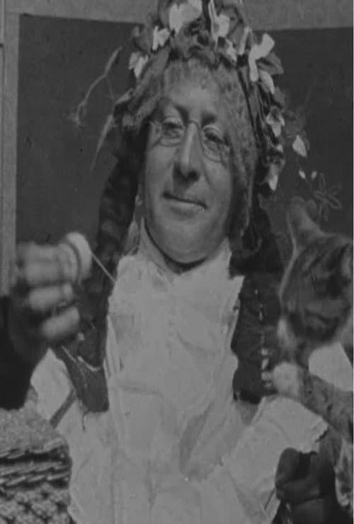 Grandma Threading Her Needle (1900) poster
