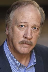 Richard L. Olsen in The Iron Orchard