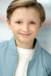 Logan Carriere in Debbie Macomber’s Joyful Mrs. Miracle