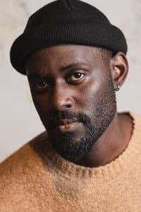 Maurice Kirya in The Girl in the Yellow Jumper