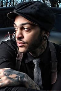 Travie McCoy in Snakes on a Video: Cobra Starship