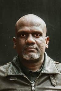 Philip Luswata in The Girl in the Yellow Jumper