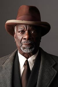 Joseph Marcell in The Man in the Hat