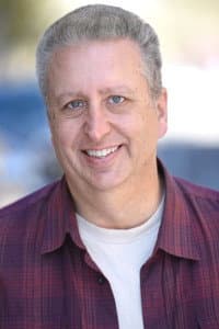 Greg Crowe in Adam Bloom
