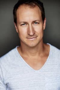 Simon Mallory in The Heckler