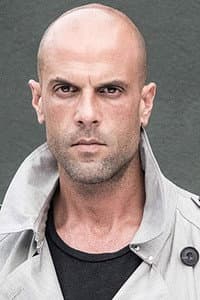 Christian George in Runner Runner