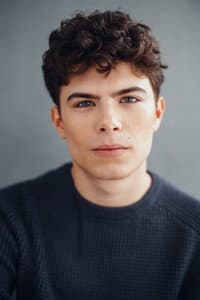 Simon Belz in Sisterhood, Inc.