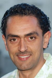 Ashraf Telfah in Oversized Coat