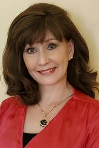 Nina Surbaugh in Saving the Christmas Ranch